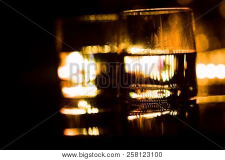 Colored Lighting Of Glasses In The Night Club Bar