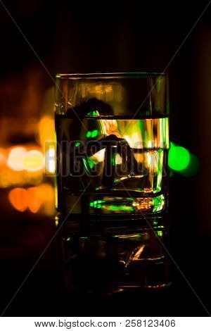 Colored Lighting Of Glasses In The Night Club Bar