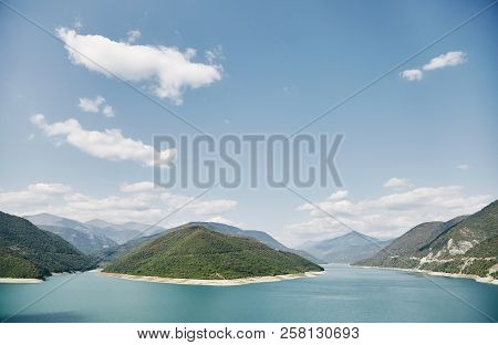Landscape Of Zhinvali Reservoir Lake Landscape With Mountains . The Main Caucasus Ridge. Georgia.