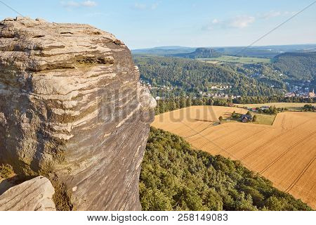 Beautiful Landscape With Old Rock And Field In Bad Schandau, Germany