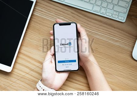 Chiangmai, Thailand - Jun, 22 ,2018 : Woman Holding A Iphone X With Social Network Service Linkedin