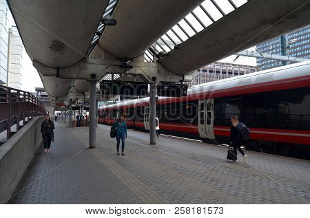 Platform and train view on Oslo central station. Oslo Central Station (Sentralstasjon) is main railway station in Oslo. June 17. 2018. Oslo,Norway