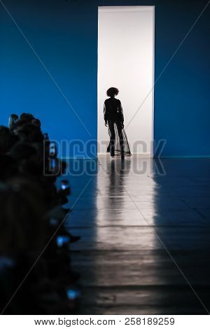 A Model On The Catwalk Finishing The Parade During The Fashion Week Presentation.