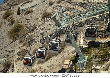 Fira Cableway Wagons Going Down To The Port On The Beautiful Island Of Santorini. Architecture, Land