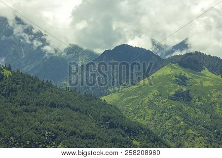 A Green Hills In The Mountain Clouds