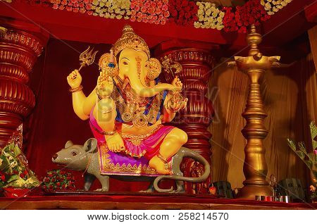 An Idol Of Lord Ganesha, Sitting On His Vehicle - A Mouse, Guruji Talim Mandal, Pune, Maharashtra, I