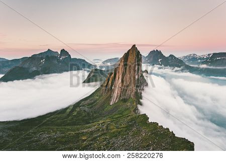 Segla Mountain Rocky Peak Landscape Over Clouds And Fjord Aerial View In Norway Travel Destinations 