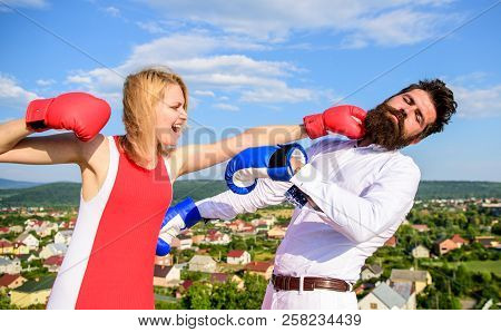 Signs You Are Henpecked Husband. Couple Boxing Gloves Fight Sky Background. Henpecked Guy Attacked B