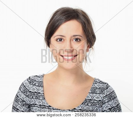 Pretty Brunette Smiling Portrait Against White Background
