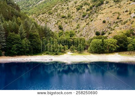 Reflections In The Lake Of San Domenico In The Gorges Of Sagittarius (italy)