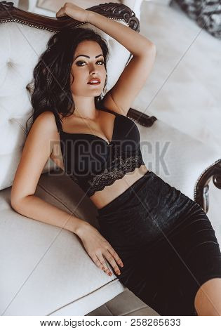 Sexy Beautiful Brunette Woman In Black Underclothes