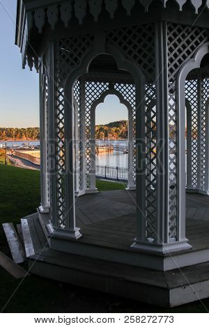 BAR HARBOR, MAINE, USA. OCTOBER 11, 2016: Morning lights with Frenchman Bay ,view with wooden gazebo in Bar Harbor.