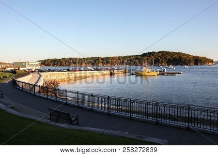 BAR HARBOR, MAINE, USA. OCTOBER 11, 2016: Frenchman Bay morning sunlight in autumn morning with seasonal colors in Bar Harbor.