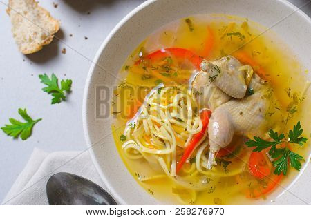 Quail Noodle Soup, Homemade Broth With Noodles And Vegetables Served With Bread Rolls, Zama, Traditi