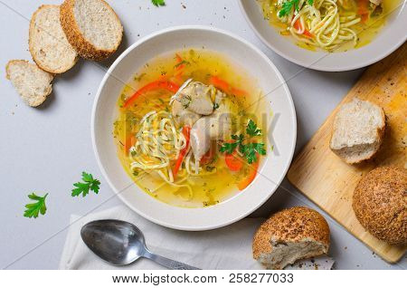 Quail Noodle Soup, Homemade Broth With Noodles And Vegetables Served With Bread Rolls, Zama, Traditi