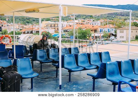 Ouranoupoli, Greece - September 23, 2014: Pilgrims Take A Ferry To The Holy Mountain Athos