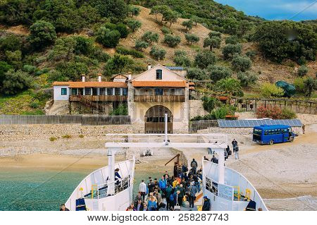 Holy Mountain, Greece - September 23, 2014: Pilgrims Take A Ferry To The Holy Mountain Athos