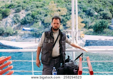 Ouranoupoli, Greece - September 23, 2014: Pilgrims Take A Ferry To The Holy Mountain Athos
