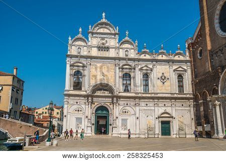 Venice, Italy - 17.08.2018: The Scuola Grande Di San Marco, Nearby The Basilica Of Santi Giovanni E