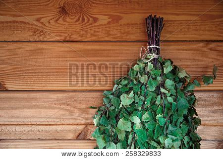The Birch Broom Hangs In A Russain Bath On A Wooden Wall Copy Sp