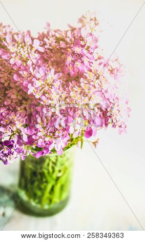 Summertime Floral Table Setting With Bright Purple Flowers With Copysace