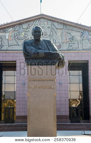 Almaty, Kazakhstan - September 15, 2018: Monument To Gabit Musrepov Near The Young Spectators Theate