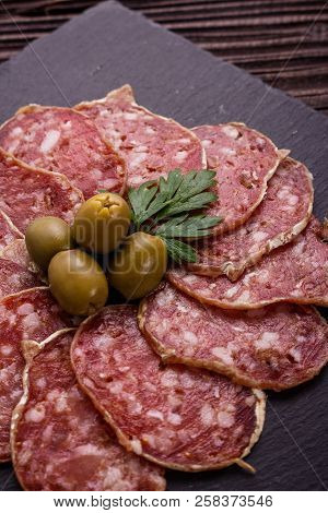 Saucisson Sec Delicious French Salami On A Wooden Background