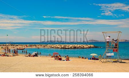 Marseilles, France, June 2018, Holidaymakers On One Of The Beach By The Mediterranean Sea, Provence