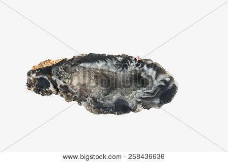 Little Chalcedony stone geode isolated. Macro photography. Mineralogy.