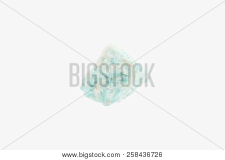 Bright Raw turquoise Amazonite from Brazil isolated. Macro photography. Mineralogy.