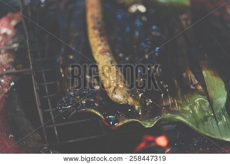 Roasted Or Grilled Notrhern Thai Spicy Sausage (sai Aua) For Sale At Thai Street Food Market Or Rest