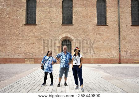 German Old Man And Thai Woman People Travel And Visit Speyer Cathedral In Rhineland Palatinate, Germ