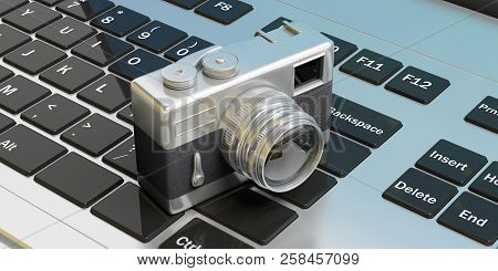 Retro Camera, On Computer Keyboard, 3D Illustration.