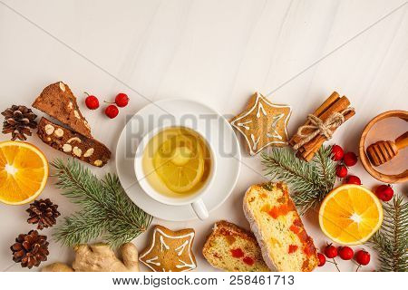 Christmas Desserts Of Different Countries (panforte, Cookies And Christmas Bread) Wth Tea On A White