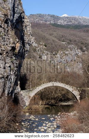 Landscape Of Ancient Bridge Of Kontodimos Or Lazaridis In Vikos Gorge And Pindus Mountains, Zagori, 