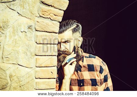 Young Man Brutal Hipster With Handsome Sexy Face Cutting His Fashion Long Beard And Moustache With C