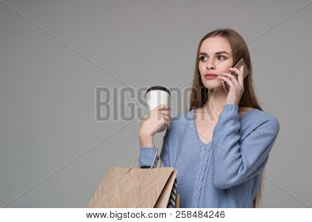 Girl In Blue With Bags, Paper Glass, Talks By Smartphone