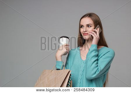 Girl In Green With Bags, Paper Glass, Talks By Smartphone
