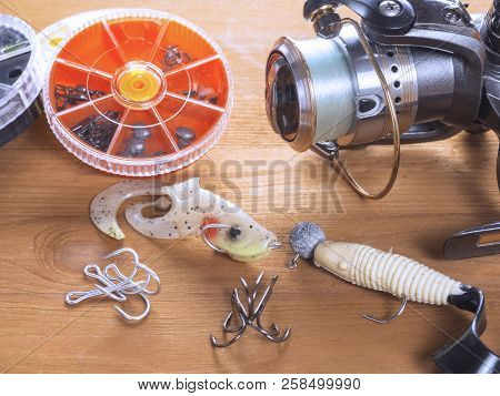 St. Petersburg, Russia October 23, 2017: Spinning Reel, Spoon-bait, Wobblers, Hooks And Small Round 