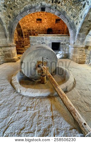 Armenia, Tatev Monastery Is A 9th Century Historical Monument. Stone Wheel For The Production Of Oil
