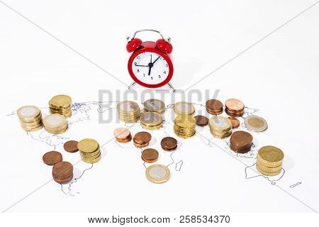 A Lot Of Coins On World Map. Abstract Photo Of World Economy