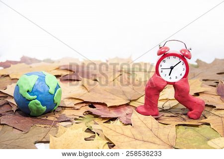 Daylight Saving Time. Wall Clock Going To Winter Time. Autumn Abstraction.