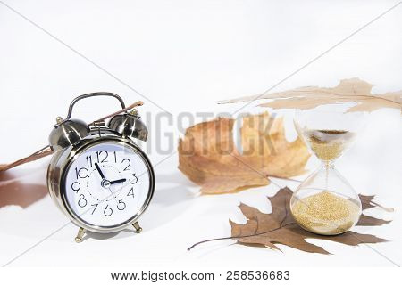 Daylight Saving Time. Wall Clock Going To Winter Time. Autumn Abstraction.