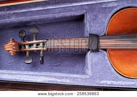 Old Violin In Opened Case. String Musical Instrument In Velvet Case. Classic Musical Instrument.