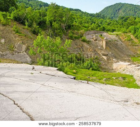 Damaged Road After Mudslide Landslide Erosion Problem