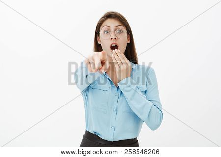 Look There, It Is Unbelievable. Shocked Excited Funny Woman In Glasses And Blue Blouse, Covering Ope