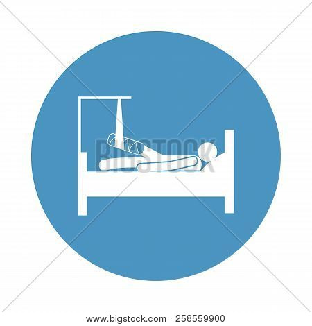 A Man Lying Down With A Bandaged Leg Icon In Badge Style. One Of Hospital Collection Icon Can Be Use
