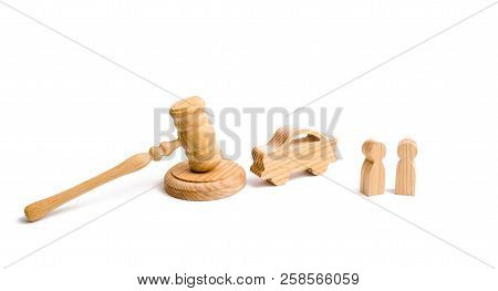 Wooden Figurine Of A Car With People In A Hammer Of The Judge On A White Background. Minimalism. Pur