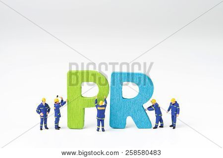 Pr, Public Relations Concept, Miniature People Staff Help Building Color Wooden Letters Forming Word