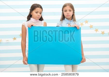 Sad Announcement Concept. Sorry For Bad News. Girl Hold Advertising Banner. Girls Kids Holding Paper